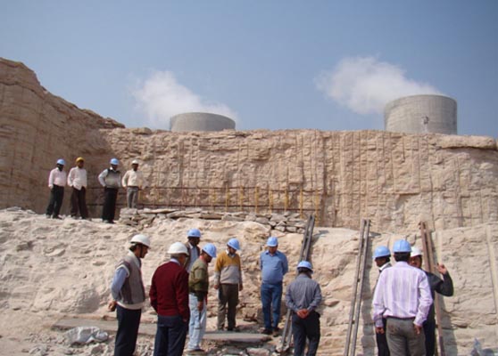 Collection of data using TS surveying equipment from tower foundation